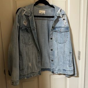 Distressed denim jacket